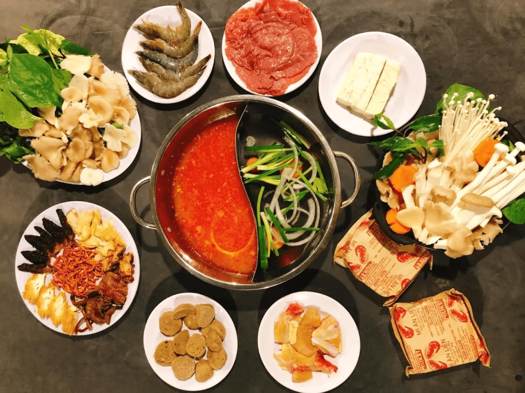 Nồi lẩu xuyên tiêu Măng Đen hai ngăn cay nồng ăn kèm nấm tươi