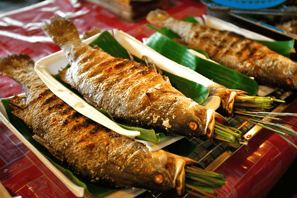 Cá trầm hương nướng mọi thơm lừng đặc sản dòng sông Quây Sơn Bản Giốc
